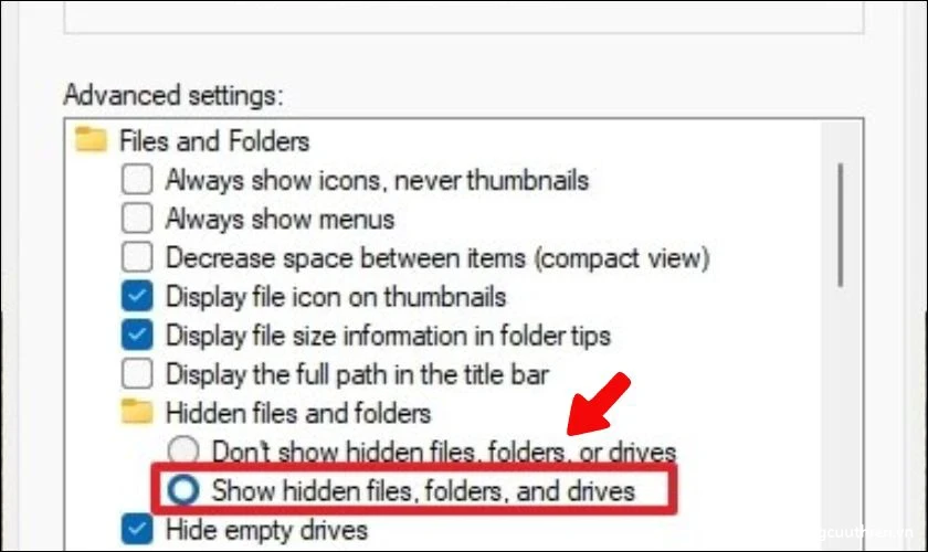 Nhấp vào tab View. Dưới mục Advanced settings hãy chọn Show hidden files, folders, and drives để ẩn ổ đĩa Win 11